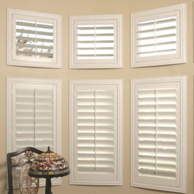 Sunburst shutters on a bay window