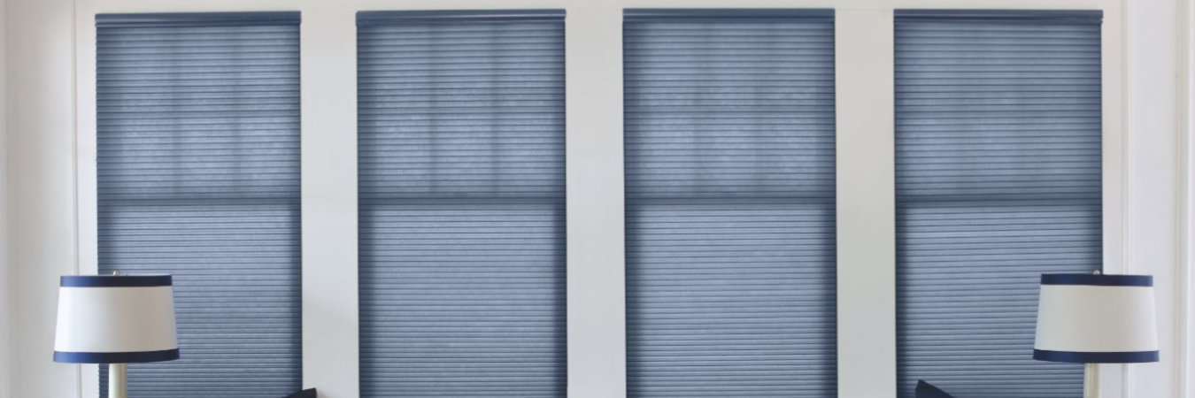 top-half view of blue cellular shades in a living room