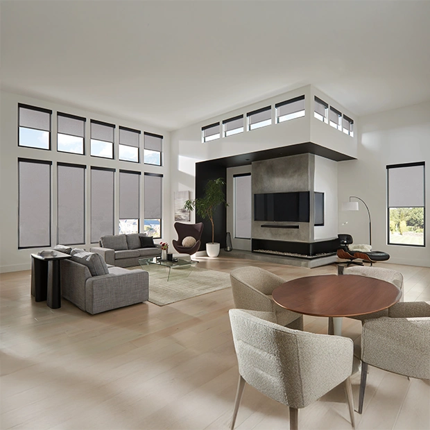 Light gray solar shades in 17 windows in a modern large living room