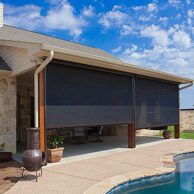 Black retractable screen door by pool.