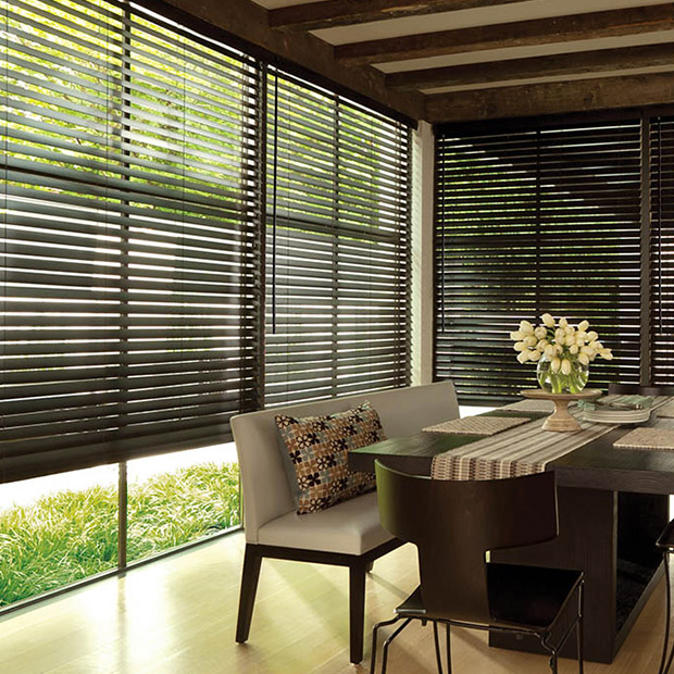 Wood blinds in a large dining room area