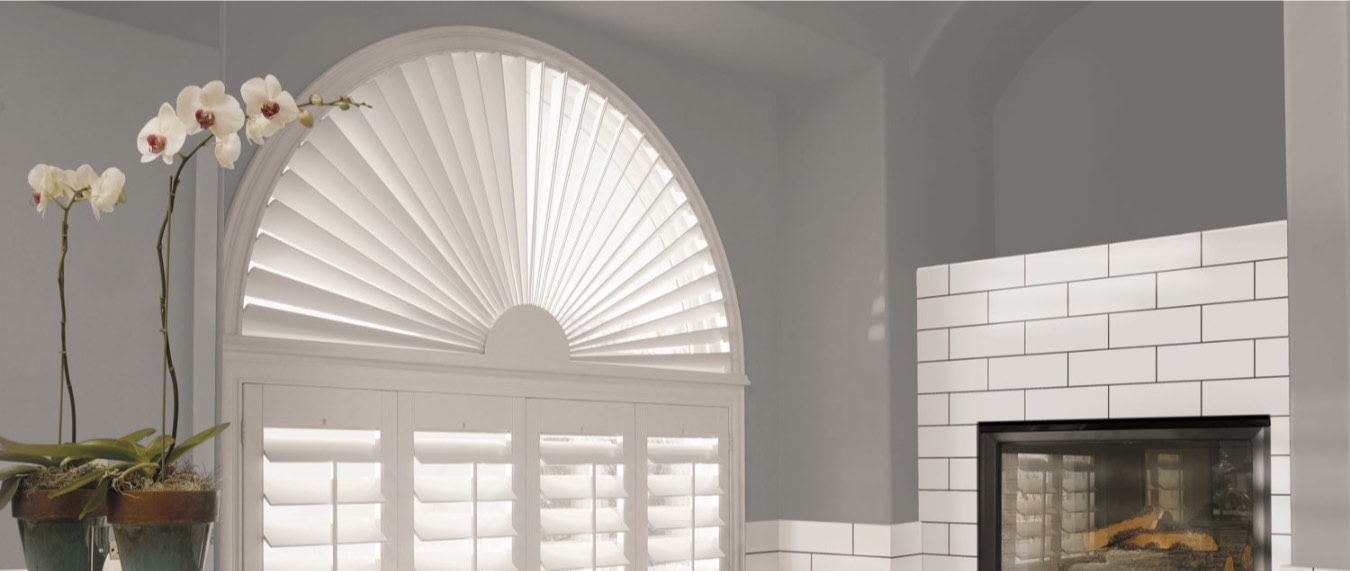 Arched shutters in bathroom