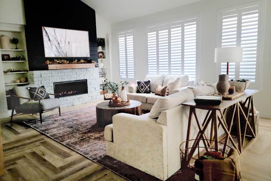 White Polywood shutters in a living room.