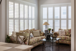 Tall plantation shutters in a living room