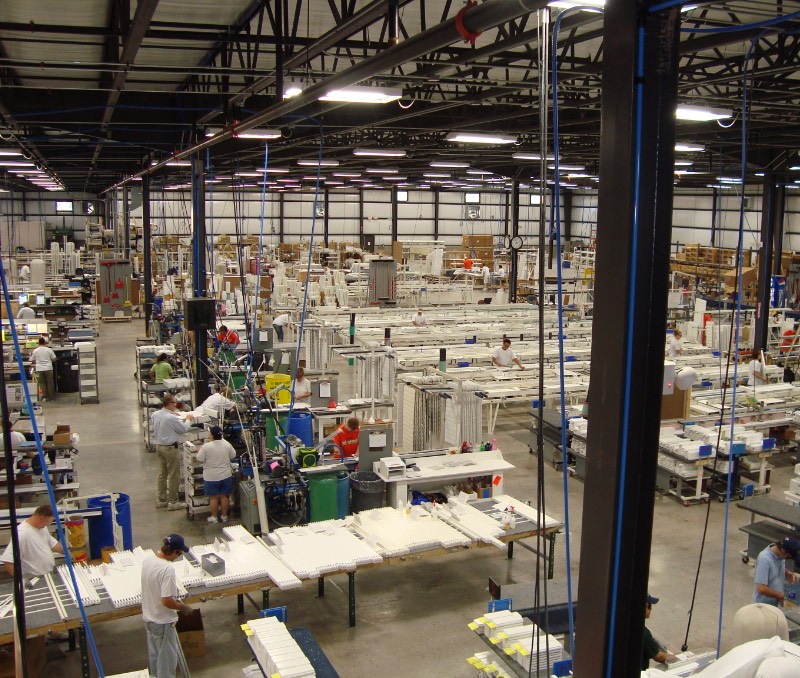 Factory worker at Sunburst Shutters