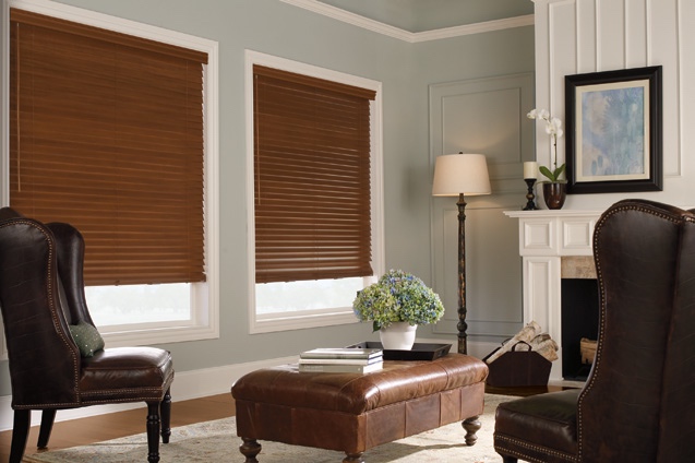 Hardwood blinds are a beautiful way to show more color and texture in your living space. Wood blinds in a small but stylish living room.
