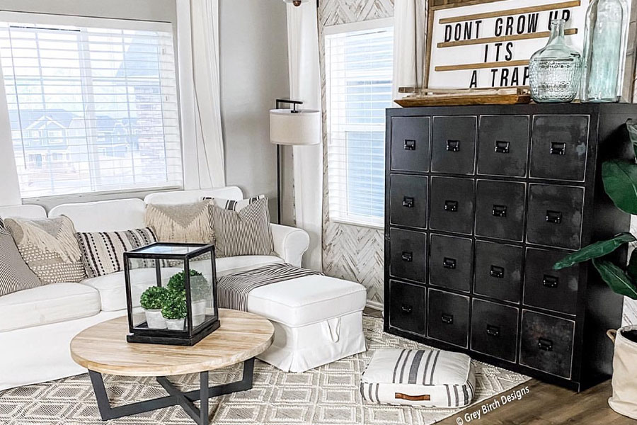 A modern farmhouse playroom with window blinds.