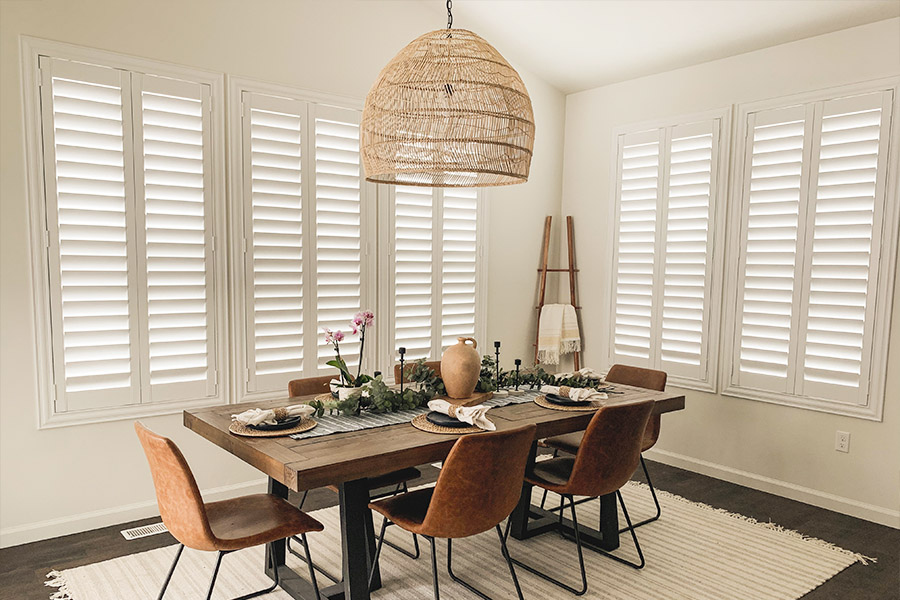 White polywood shutters in a dining room