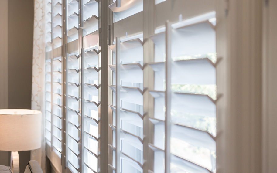 Close up of white polywood shutters