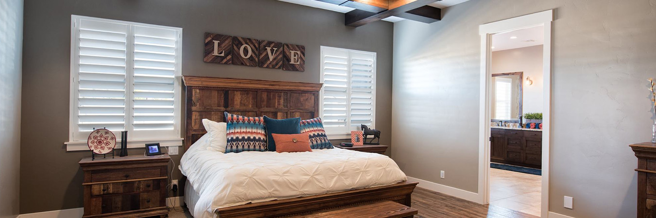 Large bedroom with hidden tilt rod windows.