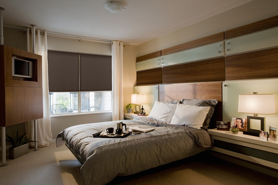 Blackout roller shades in a modern style bedroom