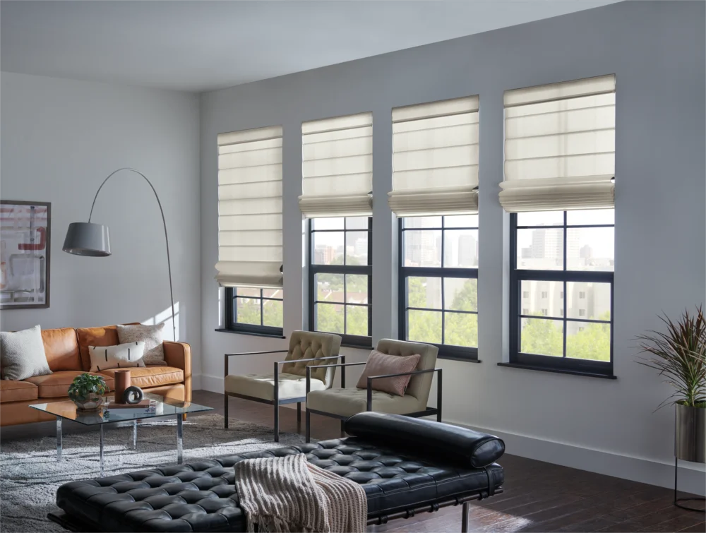Roman Shades installed on three windows in a modern living area