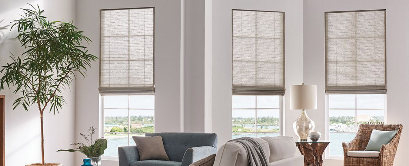 beige shades in custom small windows inside a living room