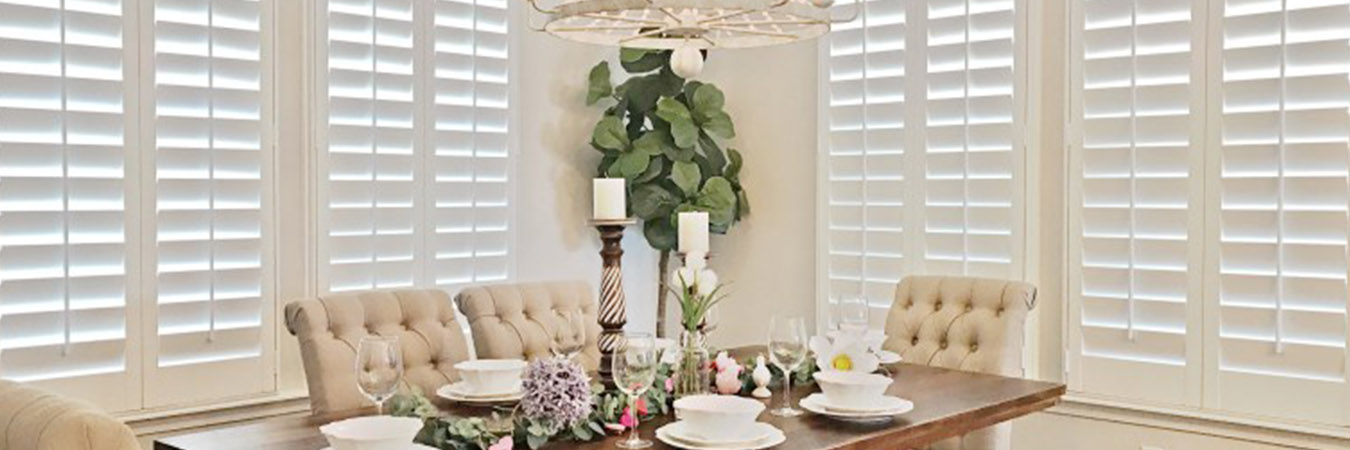 White Polywood shutters in a dining room