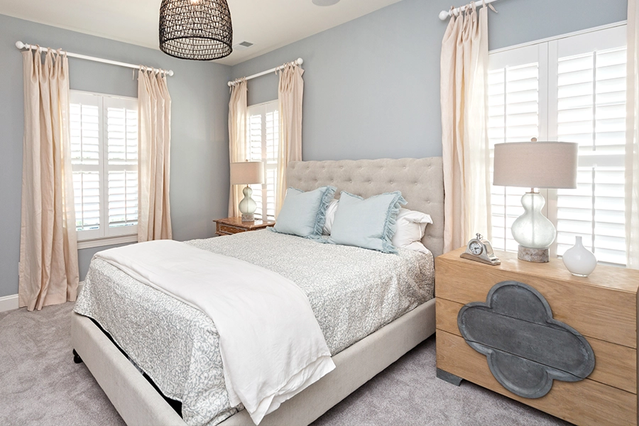 White Polywood shutters on three bedroom windows