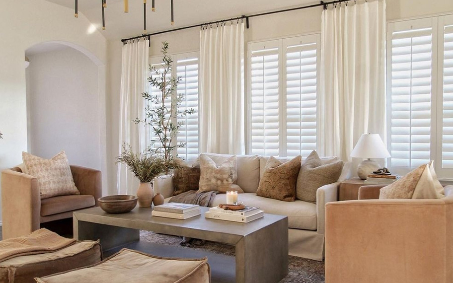 White polywood shutters in a large living room