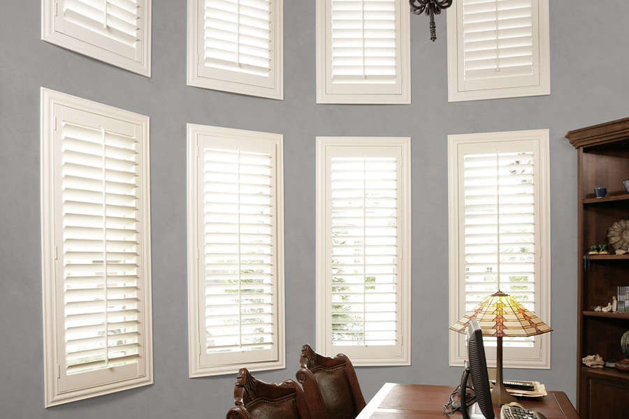 Tall white Polywood windows in a modern office.