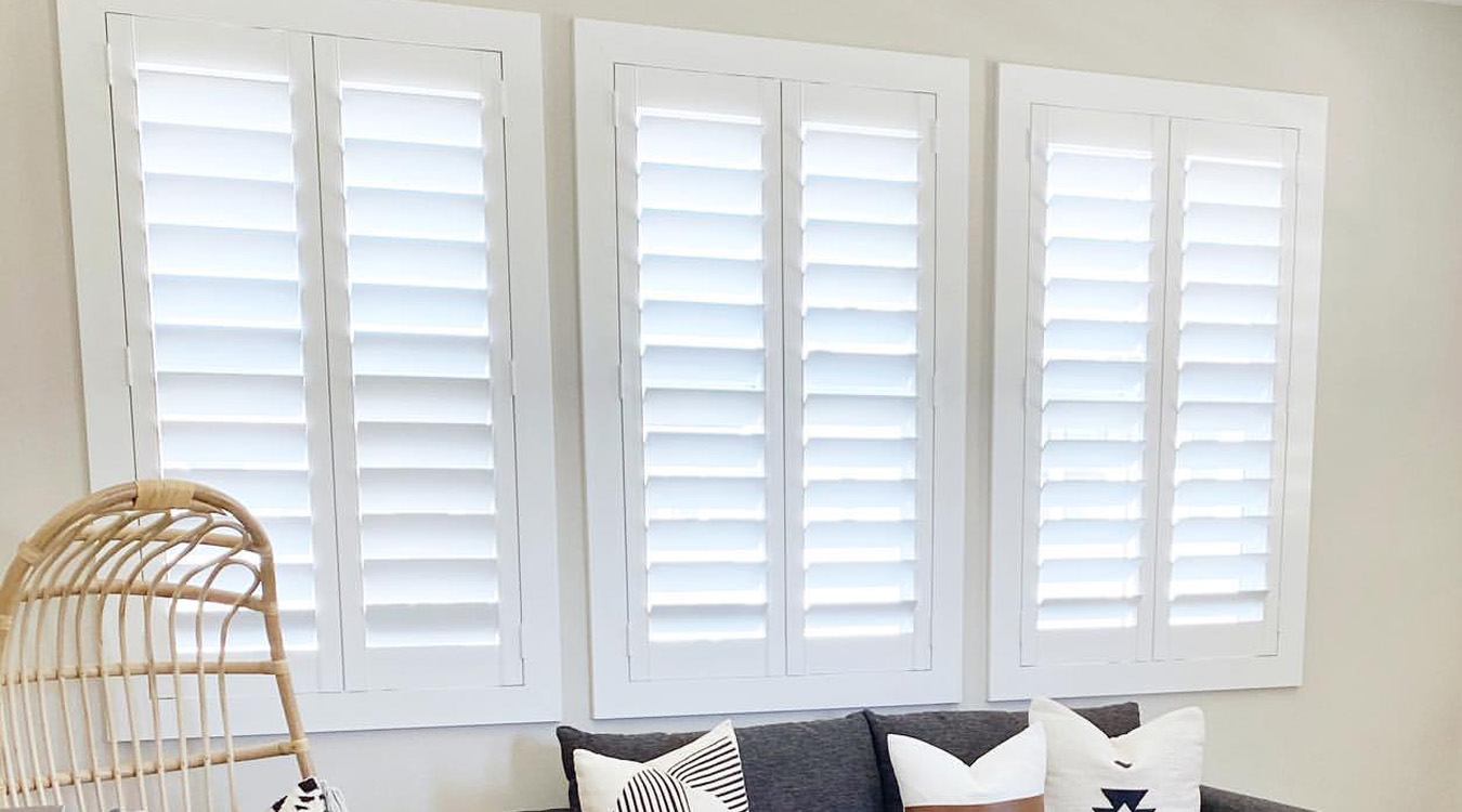 White shutters in a living room.