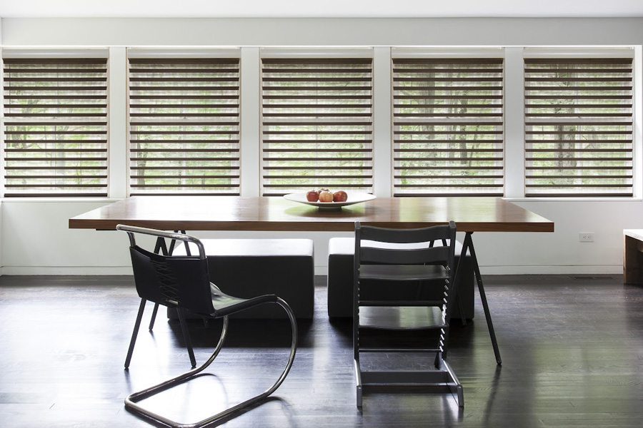 Dark gray sheer shades in a modern living room.