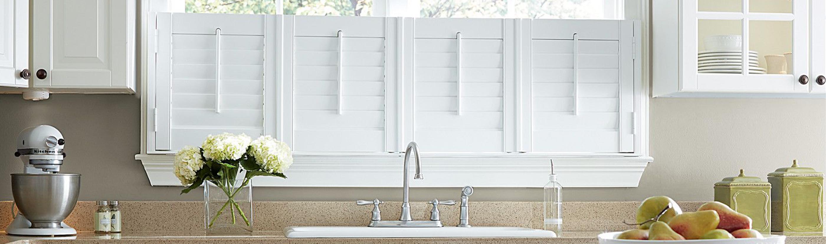 Polywood cafe shutters above a kitchen sink