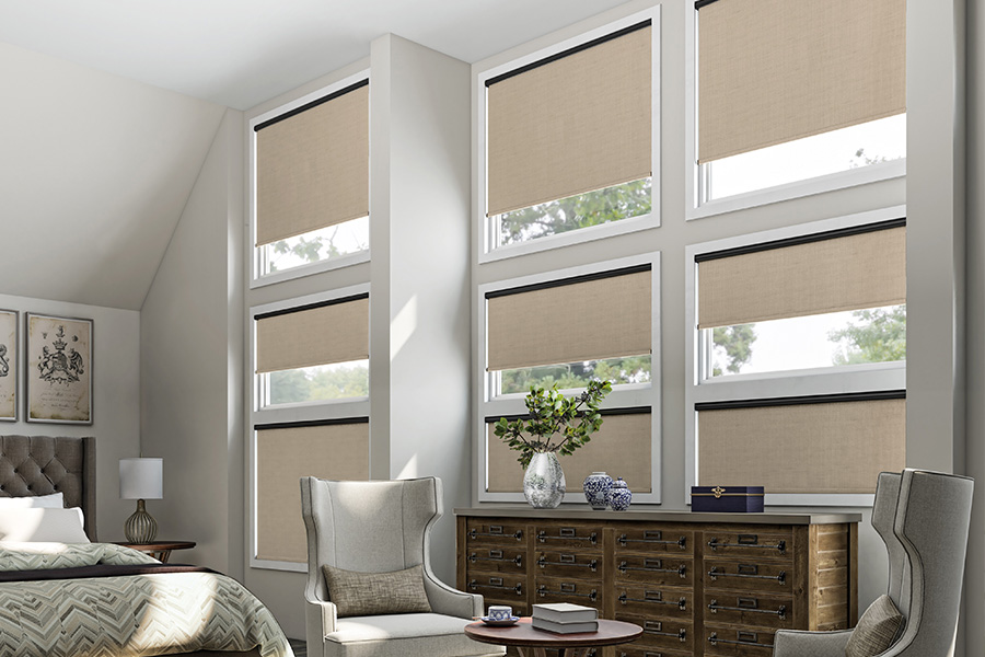 beige shades in custom small windows inside a living room