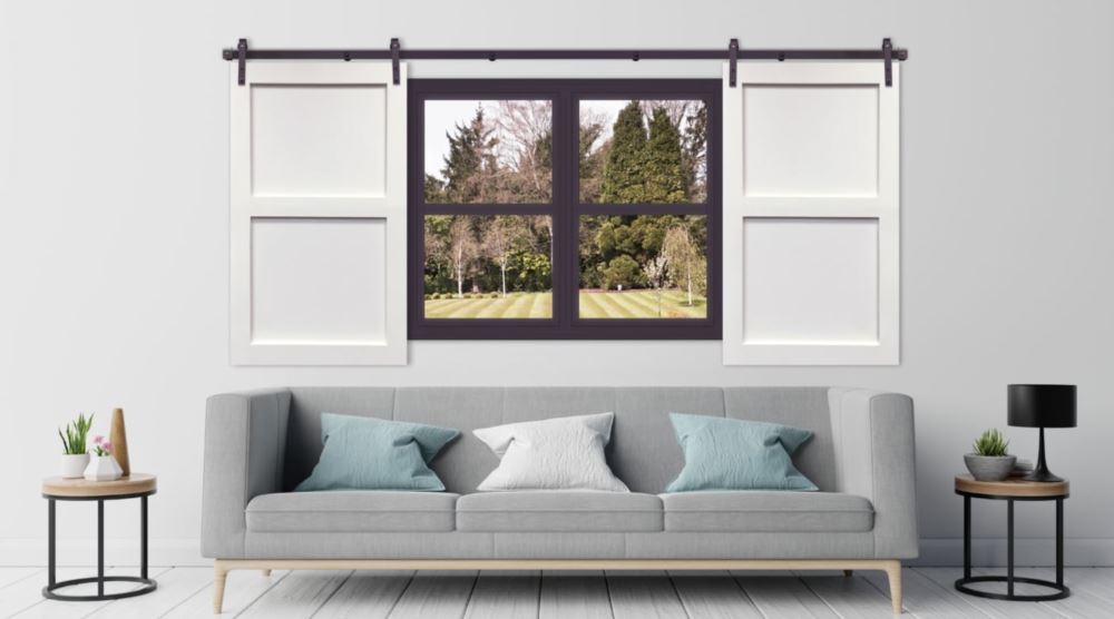 Barn door shutters over a window