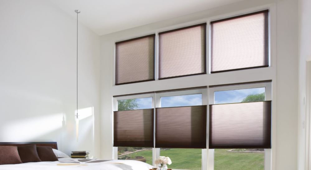Cellular shades in a high window