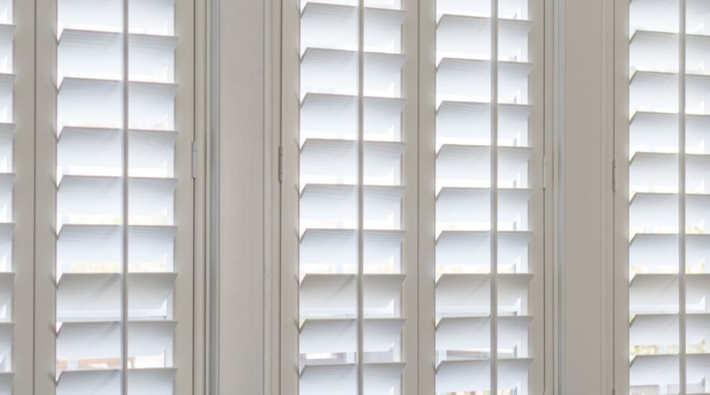 Plantation shutters on commercial windows