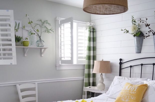 Photo Credit: Finishing Touch Decor By Jenny Plantation shutters in a bedroom