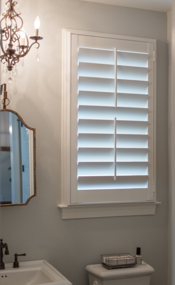 Tilt rod plantation shutters in a bathroom