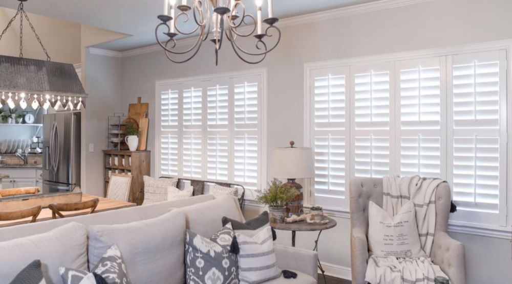 Plantation shutters in a Farmhouse living room