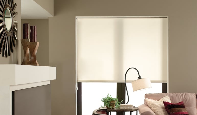 Roller shades can enhance any room. Roller shades in a living room.
