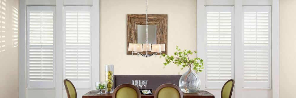 White Polywood Shutters in a large dining room.