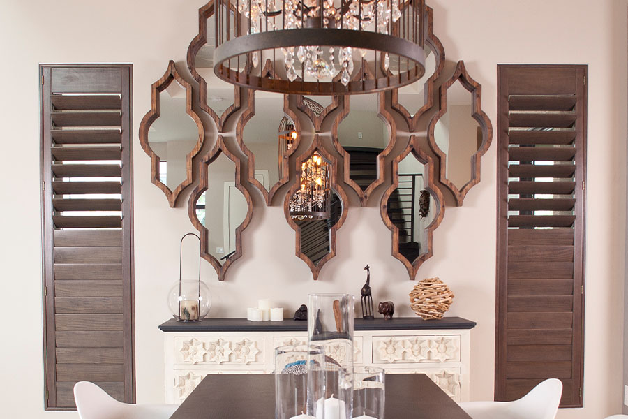 Ovation shutters inside a large dining room.