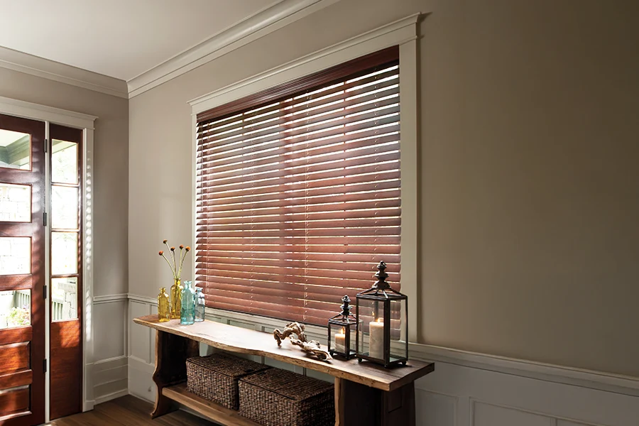 Dark wood blinds in a entryway