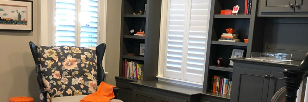 Photo credit: Meaghan Murhphy Reading nook with white louvered shutters