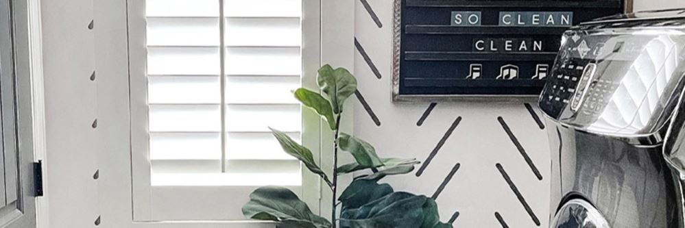 White polywood shutters in a laundry room.