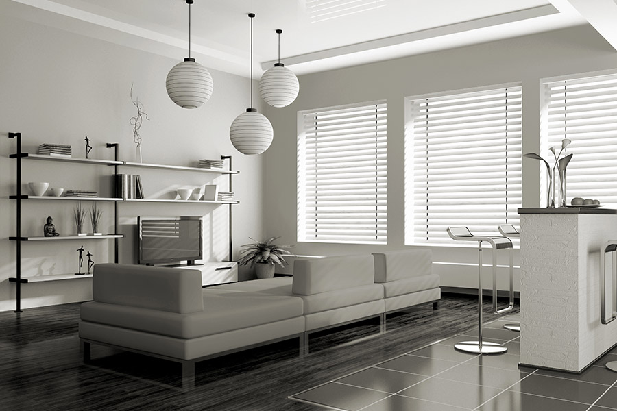 Finish your white decor with stylish white window blinds. White blinds on windows in a white living room